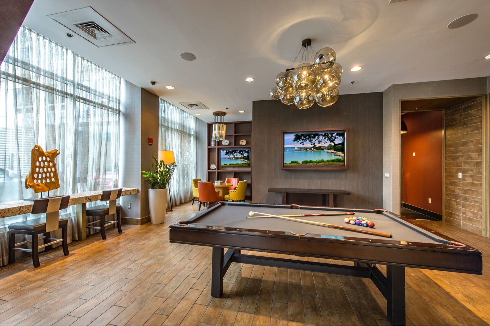 Residents’ lounge with pool table and comfortable seating