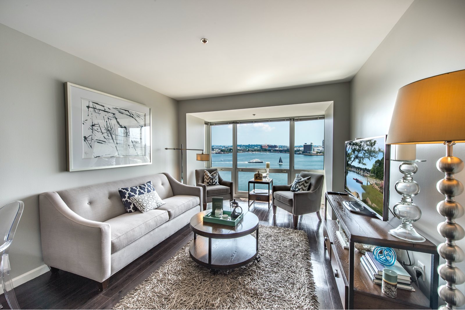 A living room with water views