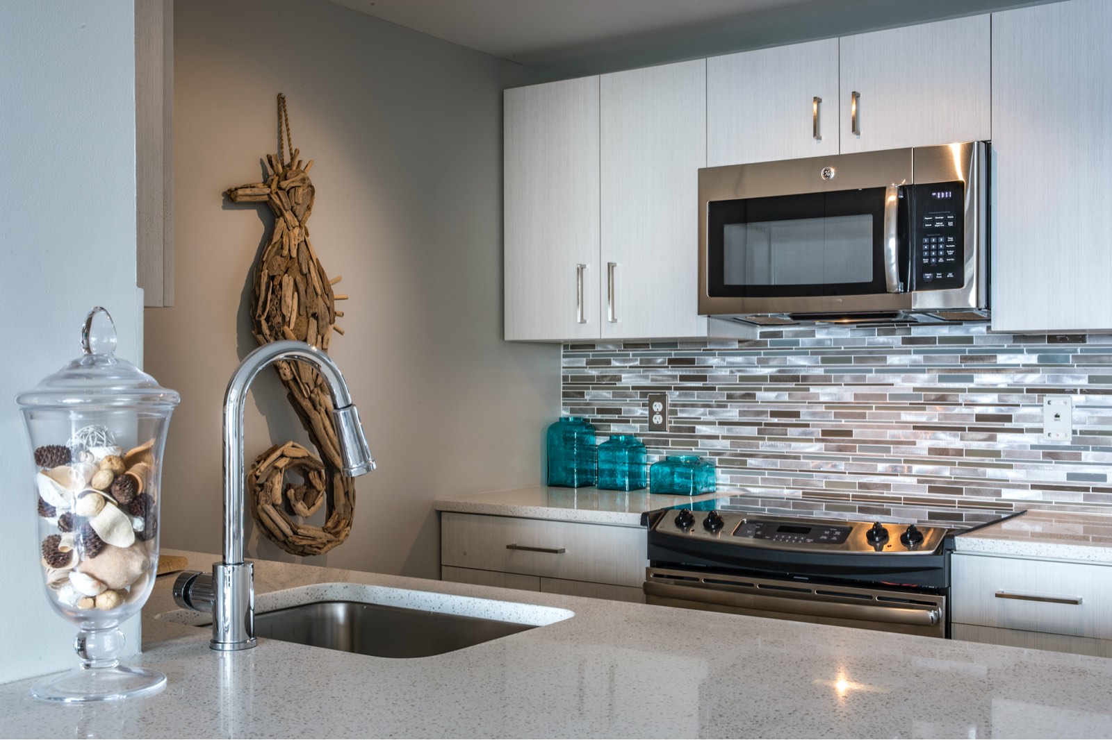 Elegant modern kitchen with white quartz countertops