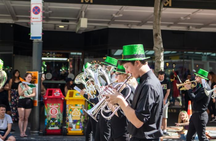 Streetband players with green hats